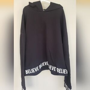 Black Hoodie with 'Believe' Trim